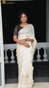 Actress lavannya sahukara in a white saree