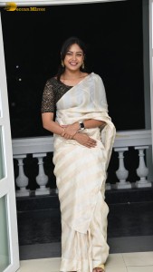 Actress lavannya sahukara in a white saree