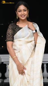 Actress lavannya sahukara in a white saree