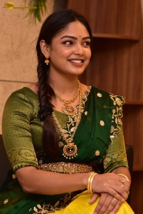 actress Lavannya Sahukara cute in a green half saree