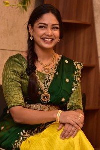 actress Lavannya Sahukara cute in a green half saree