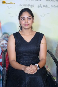 actress Lavannya Sahukara cute stills a black sleeveless dress