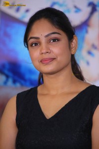 actress Lavannya Sahukara cute stills a black sleeveless dress