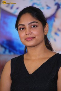 actress Lavannya Sahukara cute stills a black sleeveless dress