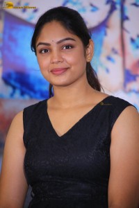 actress Lavannya Sahukara cute stills a black sleeveless dress