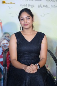 actress Lavannya Sahukara cute stills a black sleeveless dress