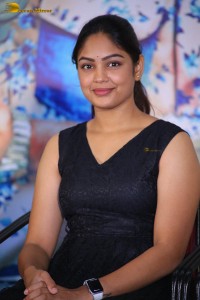 actress Lavannya Sahukara cute stills a black sleeveless dress