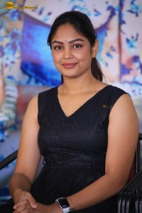 actress Lavannya Sahukara cute stills a black sleeveless dress