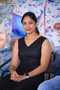actress Lavannya Sahukara cute stills a black sleeveless dress