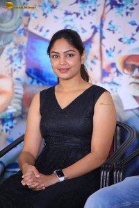 actress Lavannya Sahukara cute stills a black sleeveless dress