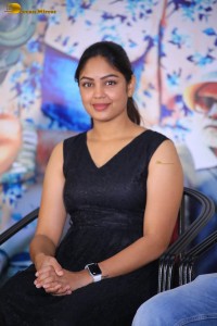 actress Lavannya Sahukara cute stills a black sleeveless dress