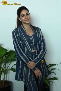 actress Lavanya Tripathi dressed in a striped pantsuit
