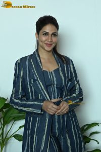 actress Lavanya Tripathi dressed in a striped pantsuit