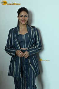 actress Lavanya Tripathi dressed in a striped pantsuit