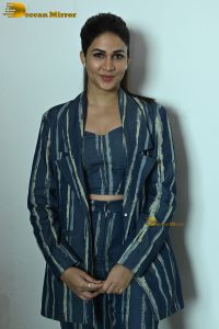 actress Lavanya Tripathi dressed in a striped pantsuit