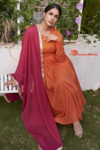 Lavanya Tripathi wearing a traditional orange Salwar Kameez