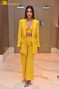 Laxmi Raai sexy look in a yellow dress