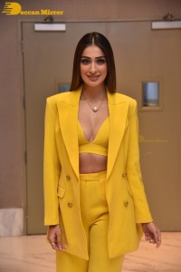 Laxmi Raai sexy look in a yellow dress