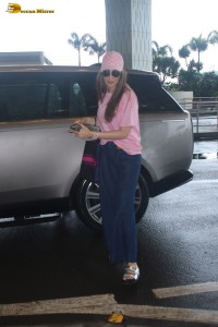 actress Laxmi Raai dressed casually in pink top and denim jeans