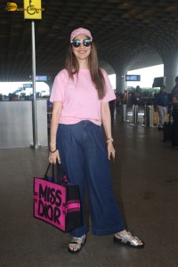 actress Laxmi Raai dressed casually in pink top and denim jeans