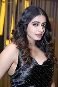 actress Maanasa Choudhary in a sleeveless black dress