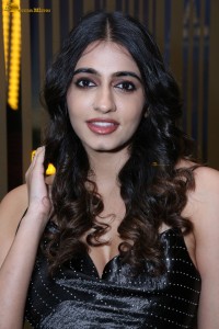 actress Maanasa Choudhary in a sleeveless black dress