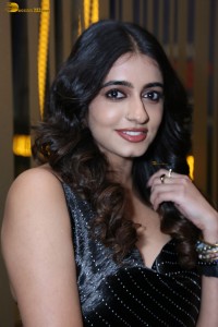 actress Maanasa Choudhary in a sleeveless black dress