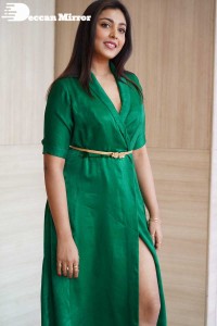 Actress Madhu Shalini photoshoot in a green dress