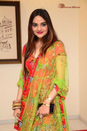 Tamil and Telugu Actress Madhubala in a red and green dress