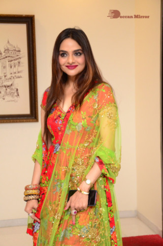 Tamil and Telugu Actress Madhubala in a red and green dress