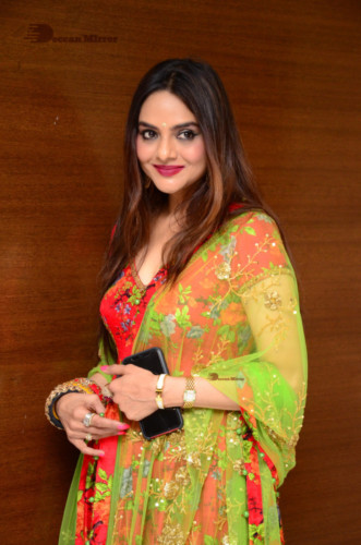 Tamil and Telugu Actress Madhubala in a red and green dress