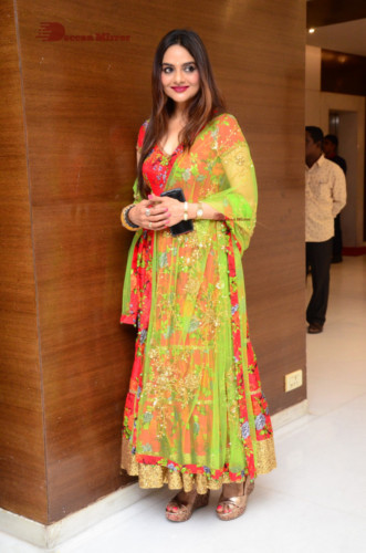 Tamil and Telugu Actress Madhubala in a red and green dress