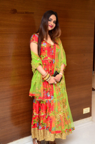 Tamil and Telugu Actress Madhubala in a red and green dress