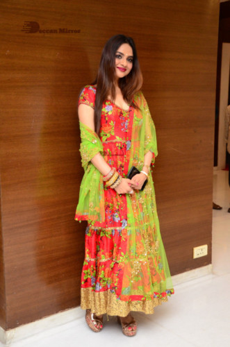 Tamil and Telugu Actress Madhubala in a red and green dress