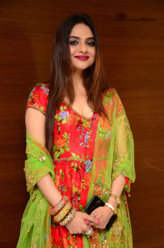 Tamil and Telugu Actress Madhubala in a red and green dress