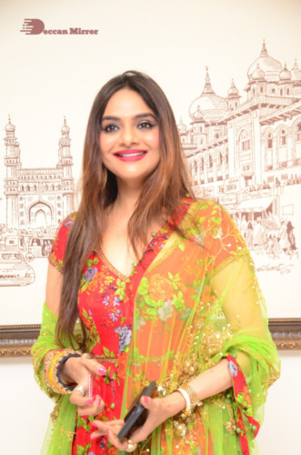 Tamil and Telugu Actress Madhubala in a red and green dress