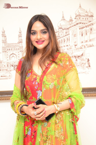 Tamil and Telugu Actress Madhubala in a red and green dress