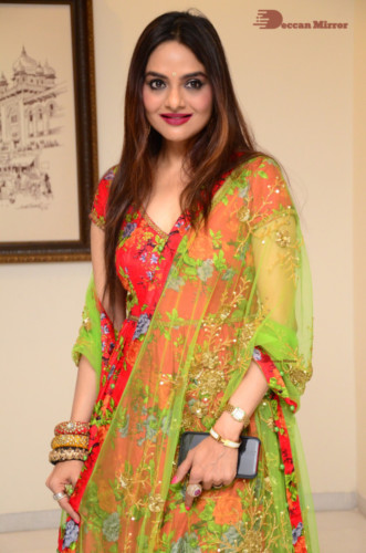 Tamil and Telugu Actress Madhubala in a red and green dress