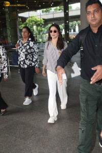 actress Madhuri Dixit spotted at mumbai airport in a long sleeves shirt