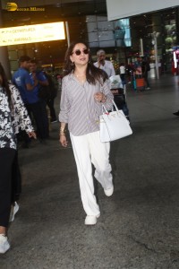 actress Madhuri Dixit spotted at mumbai airport in a long sleeves shirt