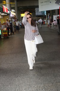 actress Madhuri Dixit spotted at mumbai airport in a long sleeves shirt