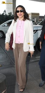 bollywood actress Madhuri Dixit stylish looks at mumbai airport in sunglasses