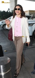 bollywood actress Madhuri Dixit stylish looks at mumbai airport in sunglasses