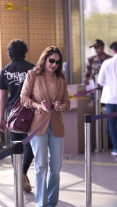 bollywood star Madhuri Dixit gorgeous in a beige color jacket at airport