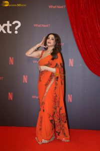 actress madhuri dixit beautiful in a orange red saree