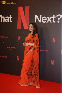 actress madhuri dixit beautiful in a orange red saree