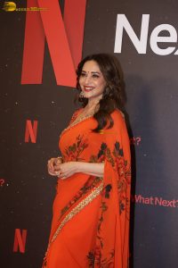 actress madhuri dixit beautiful in a orange red saree