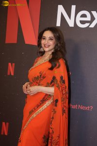 actress madhuri dixit beautiful in a orange red saree