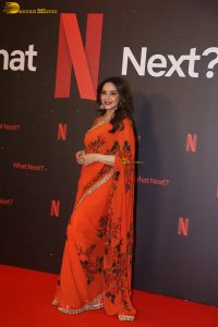 actress madhuri dixit beautiful in a orange red saree