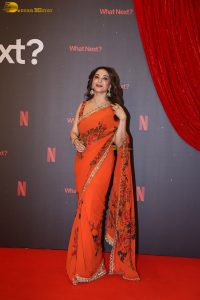 actress madhuri dixit beautiful in a orange red saree